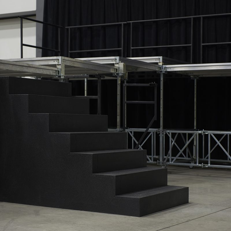 Stage with stairs and gardrails